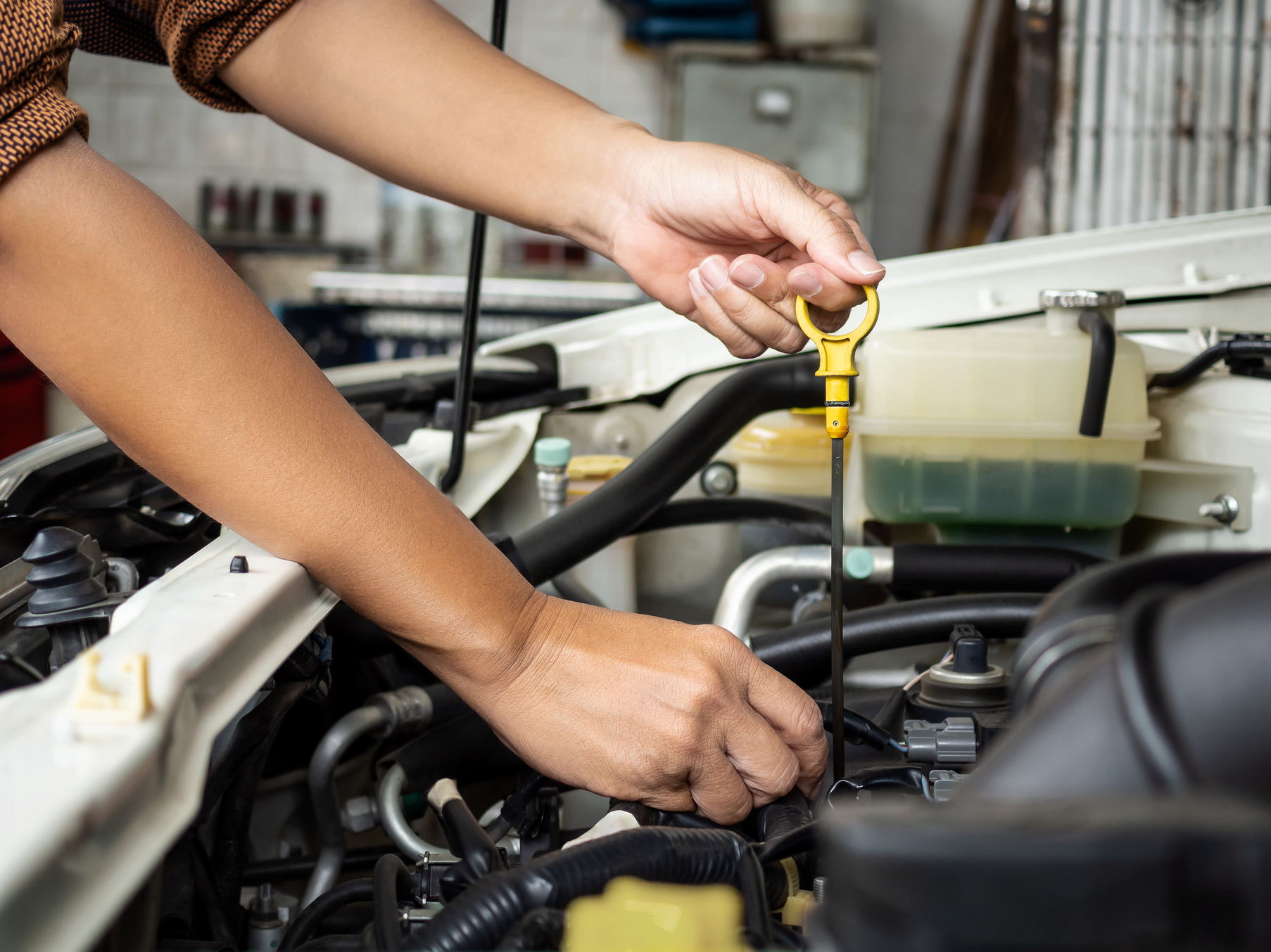 Technician work in car auto service